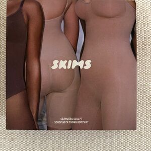 SKIMS Tan and Black Shapewear Sculpting Bodysuit